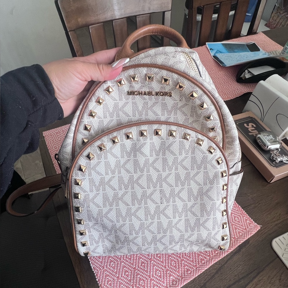 Michael kors monogram backpack.